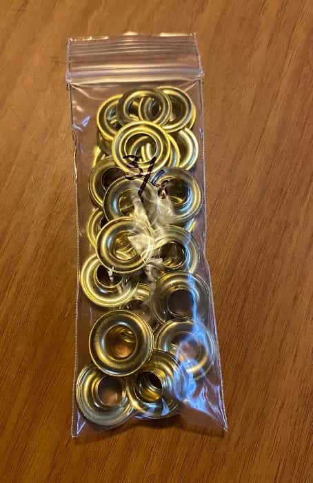 Grommets. Size 2″ 3/8 diameter holes. 25 sets per pack