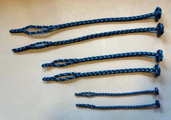 EIGHT STRAND SQUARE BRAIDED JESSES IN THREE SIZES black and blue color with flat Sennit Rose knot