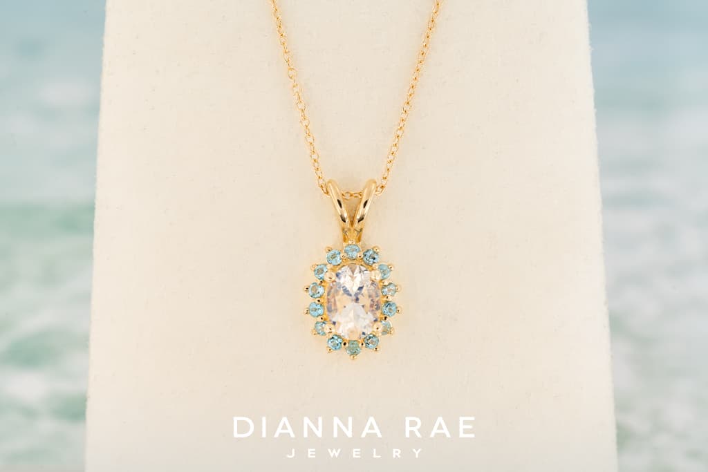 Yellow Gold Moonstone Pendant with Swiss Blue Topaz Halo