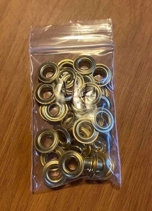 Grommets. Size “0”, 1/4″ diameter hole 25 per pack