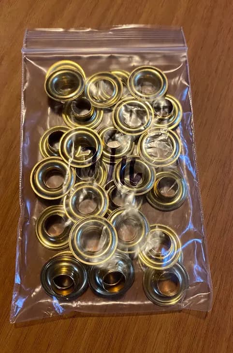 Grommets. size 3″ 7/16 diameter hole. 25 sets per pack