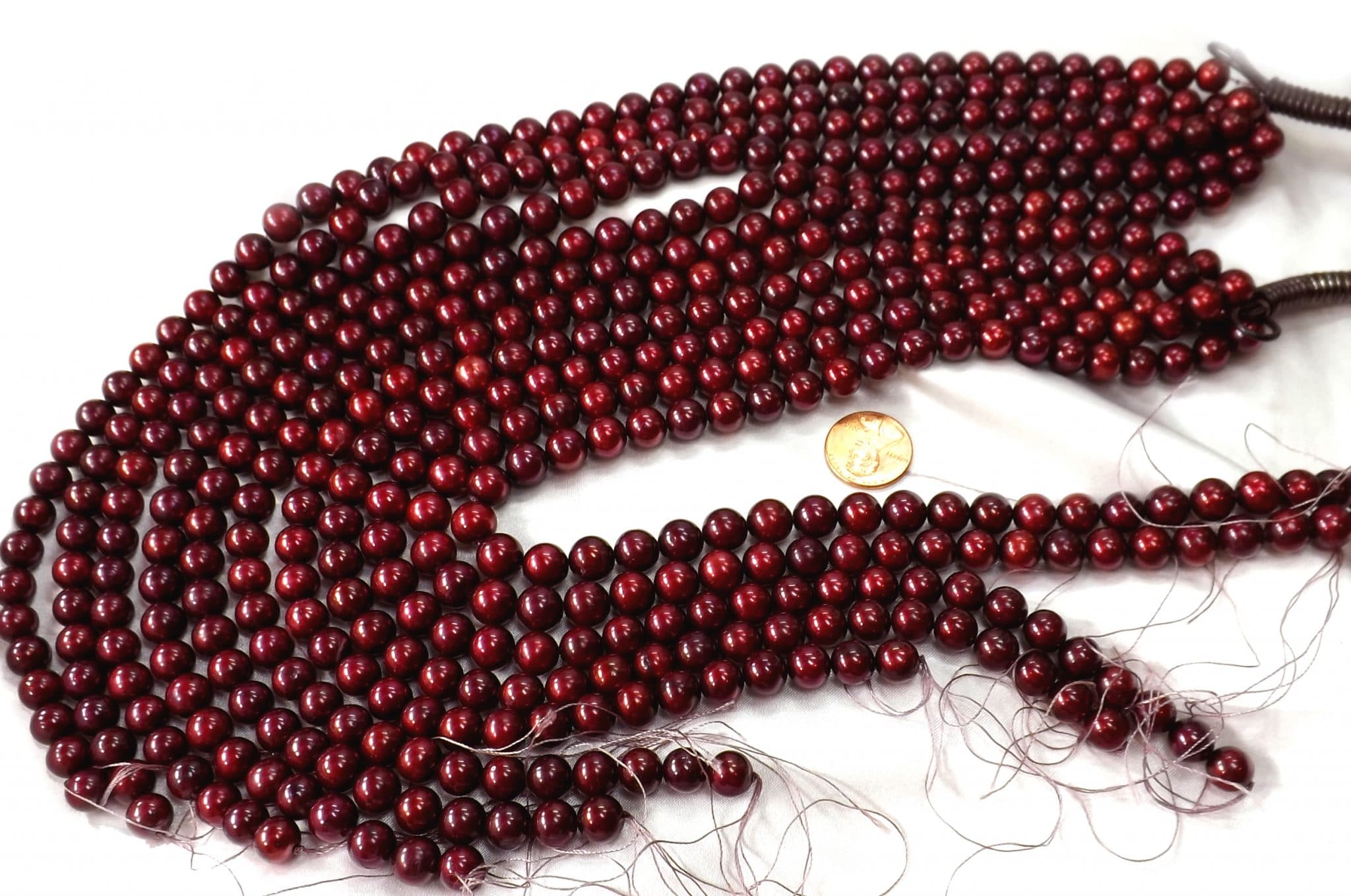 Deep Cranberry Red Colored 9-10mm High Quality Round Pearl Strands