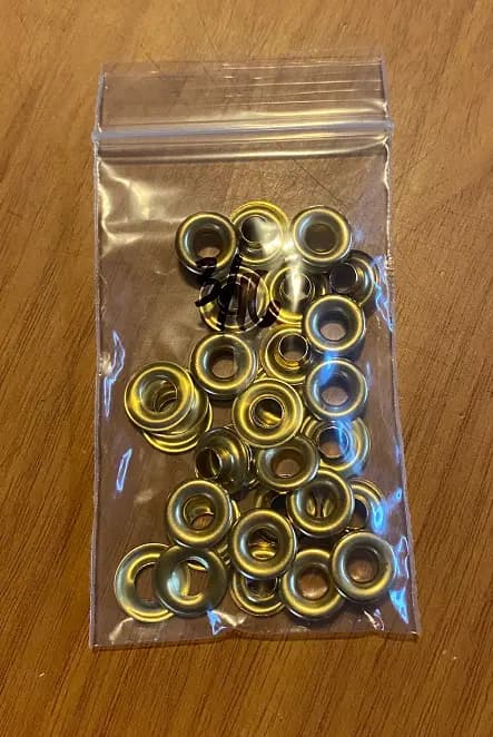 Grommets, size 00″ 3/16″ diameter hole. 25 sets per bag